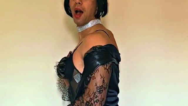 Beautiful and sexy femboy in black satin, lingerie and scarpin. The best video of the day