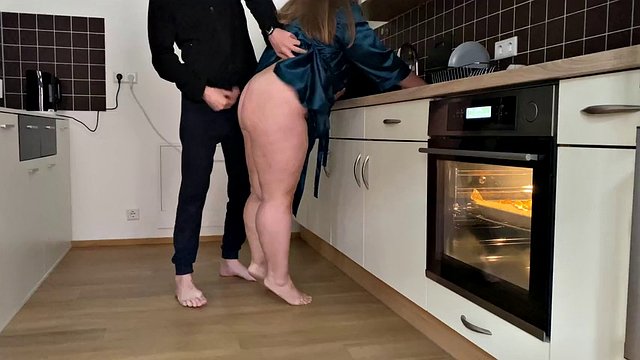 Horny mother-in-law and son-in-law masturbate together in the kitchen