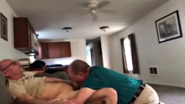 Clothed grandpa on his knees sucking daddy's cock