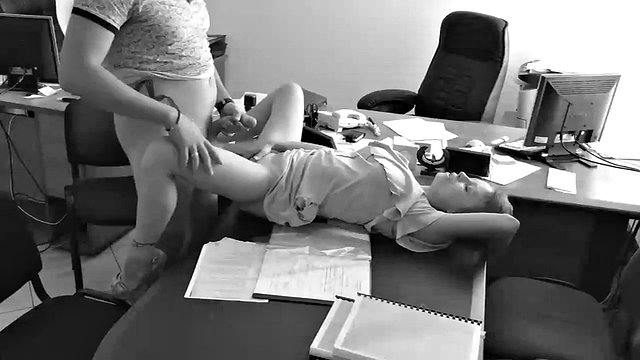 The boss fucks his tiny secretary on the office table and records it with a hidden camera