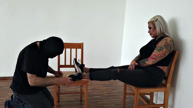 foot slave and his tattooed blonde