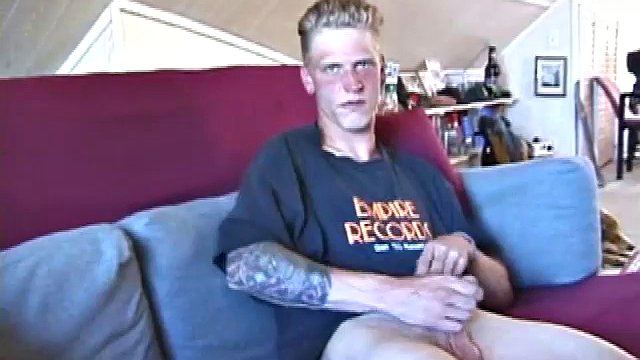 Freckled face Brandon invites us to watch him jack off, which really turns him on. The pants strip off and his anal toy goes in and Brandon keeps stroking along through it all.