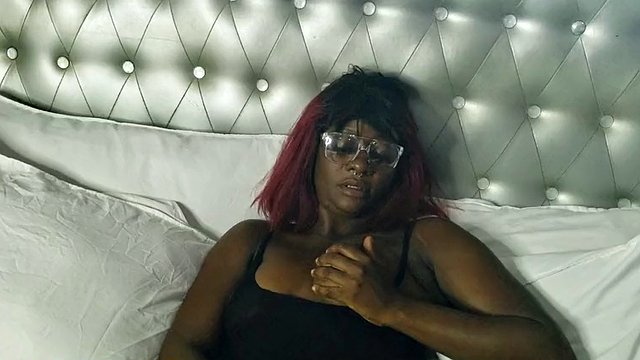 Sexy black brunette was alone at home and was bored, but she made herself squirt while watching porn