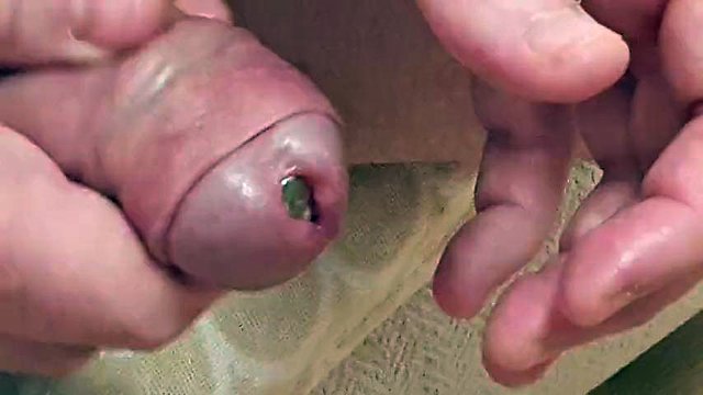 Extreme deep  cock sounding  close up and a cumshot while sounding  rod is fully  inside