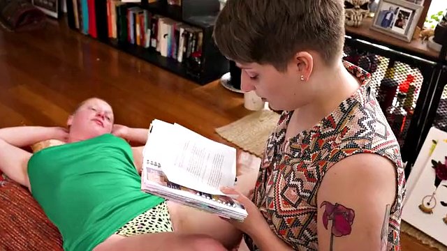 Busty redhead lesbian gets her hairy pussy licked and fingered