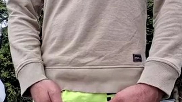 Almost caught. Skinny boy is naked in nature. Jerking off his big cock and pissing in the morning sun