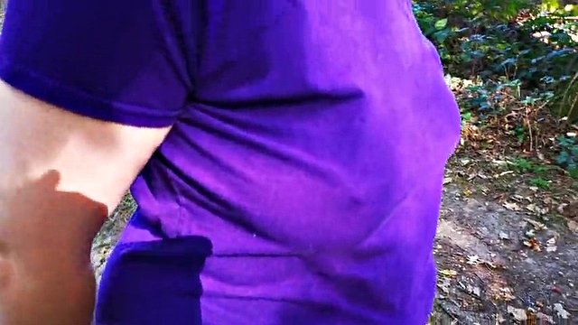 Spanking my naked tits in the woods