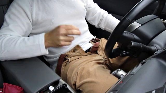 Rainy day jerk-off in my car in a parking lot, verbal, stroking my cock and cumming. Wearing khakis and nice orgasm