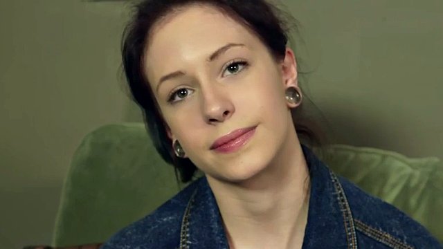Perverted hipster does naked yoga and fingers her wet pussy