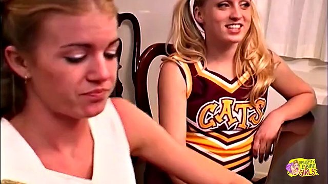 Sexy mature woman has fun with hot cheerleaders on the dining table