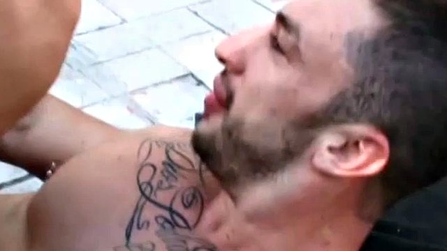 Beefcakes having anal sex outdoors