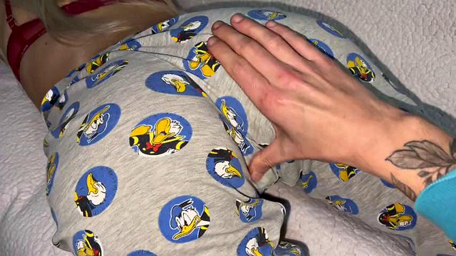 Stepmom was lying reading a book and helped to cum on her hot elastic ass