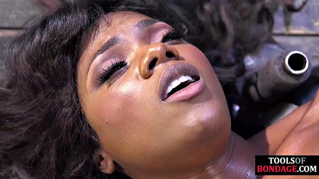 Skinny petite ebony spanked in dungeon