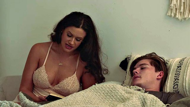 Sex with busty MILF Penny Barber begins after she noticed her stepson's erection in her bed