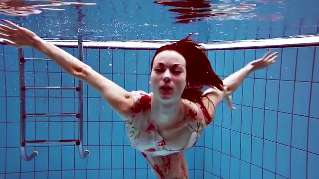 Croatian cutie dressed Martina swims and strips