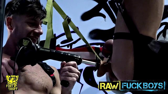 Strong male fucks his blonde slut with a fuck machine in nasty gay femdom