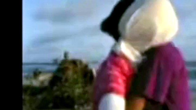 indonesian- hijab girl fucks on the beach