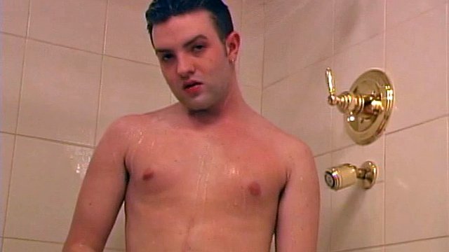 Sexy 21 year old Jeremy West is naked and enjoying a hot shower. First naked and slowly stroking his cock, the young man soon picks up the pace.