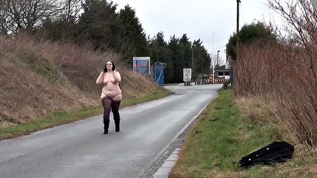 Ugly fat slut walking naked on a public road