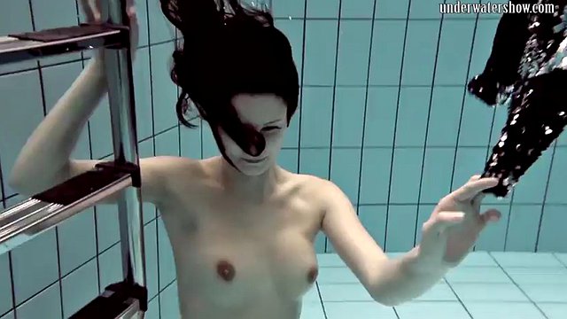 Naked Russian mermaid in the pool