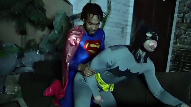 Hung black superman barebacking batman after getting blown