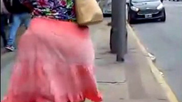 Big ass babe and calves in public in a loose skirt
