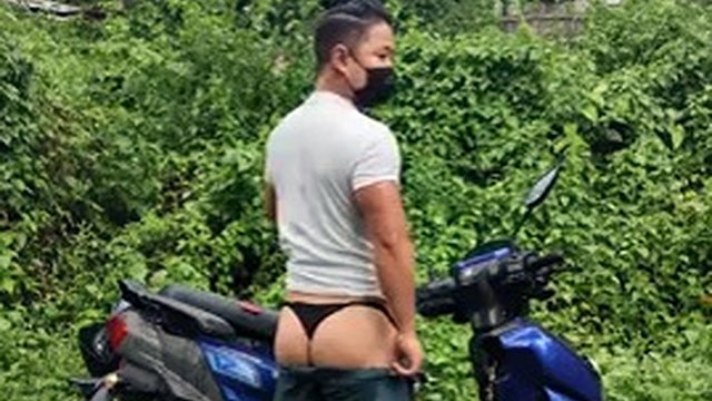 Wet and rainy masturbating in shorts and undressing near the road in a scooter near the women's police station. Nervous cock